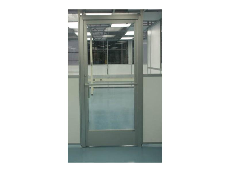 Aluminum framed door in a modular cleanroom environment.