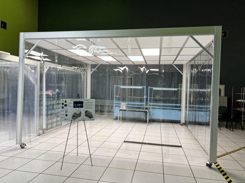 Modular softwall cleanroom by Gerbig Cleanrooms, featuring clear panels and a blue interior.