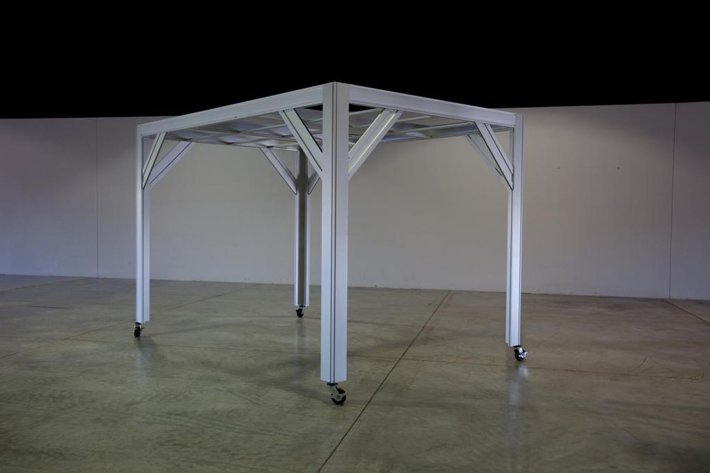 Completed white aluminum framework of SW8128 modular cleanroom on wheels.